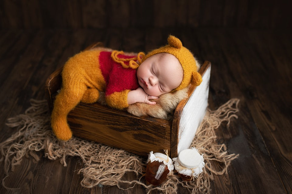 Knitted footed pyjama and bonnet, newborn size, pooh, PRE ORDER winnie.